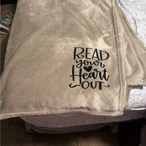 Cozy Grey fleece Throw Blanket says “read your heart out!”